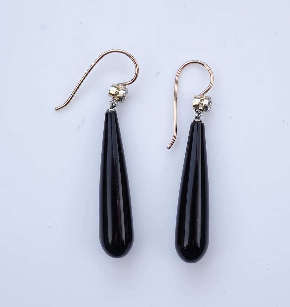 A pair of Art Deco onyx and diamond earrings, early 20th century
